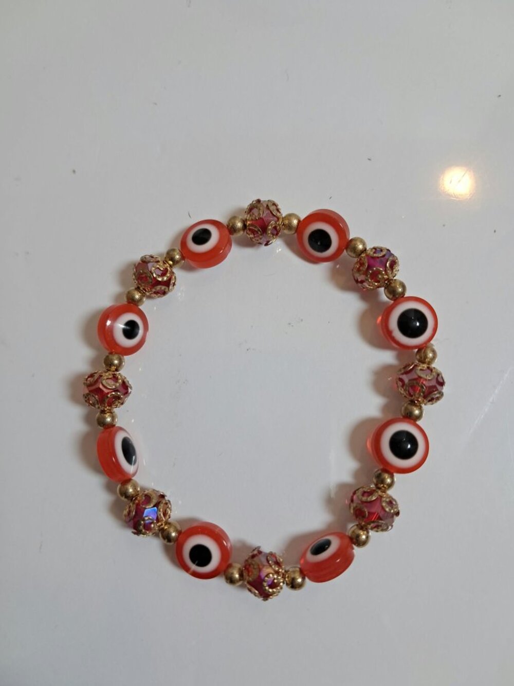 Red Evil Eye Stretch Bracelet Gold Tone Resin Beaded